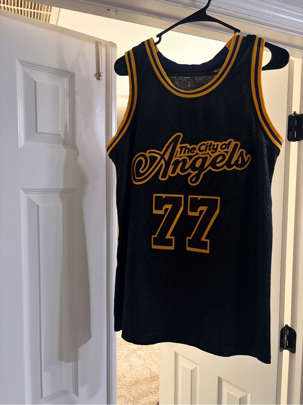 The City of Angels Black & Gold Basketball Jersey - 77